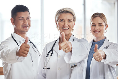 Buy stock photo Doctor, team and portrait smile with thumbs up for healthcare success, good job or thank you at hospital. Happy medical professional in teamwork showing thumb emoji for winning, yes or agreement