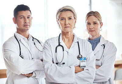 Buy stock photo Healthcare, teamwork and portrait of serious doctors in hospital for wellness, medical care and support. Collaboration, clinic and health workers with crossed arms for insurance, trust and medicine 