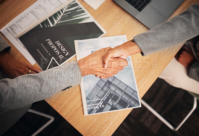 Buy stock photo Top view, handshake or teamwork collaboration in meeting designer company, global marketing or advertising office. Manager, ceo or leadership shaking hands with worker, employee or partnership woman