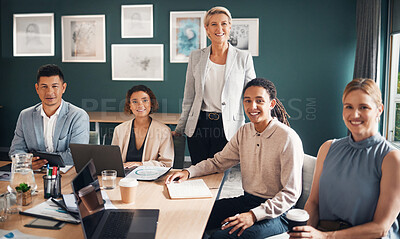 Buy stock photo Portrait, group of business people at desk with smile and confidence at meeting for employees in office. Teamwork, about us and leadership, senior lawyer with happy legal team at advisory law firm.