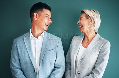 Buy stock photo Mockup, business people and laughing team in studio for fun and happy conversation or comedy on green background.Partnership and man with senior woman with humor, joke or discussion while isolated