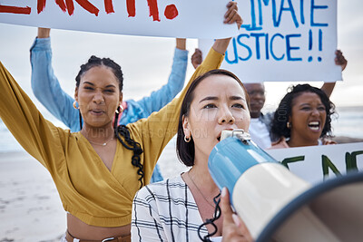 Buy stock photo Climate change protest, megaphone and Asian woman with crowd at beach protesting for environment, global warming and to stop pollution. Save the earth, activism and female leader shouting on bullhorn