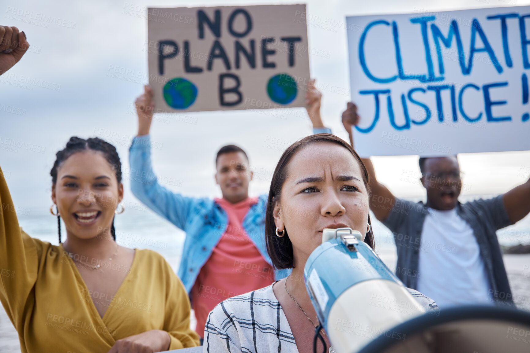 Buy stock photo Megaphone, climate change protest and Asian woman with crowd at beach protesting for environment and global warming. Save the earth, group activism and people shouting on bullhorn to stop pollution.