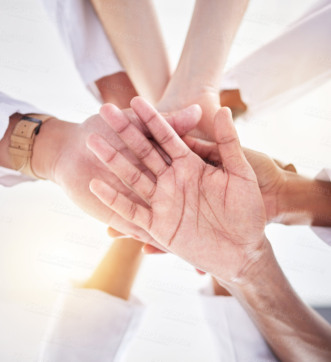 Buy stock photo Healthcare, teamwork and below hands of doctors for support, partnership and medicine trust. Motivation, success and medical workers in hand gesture for solidarity, mission and collaboration goals 
