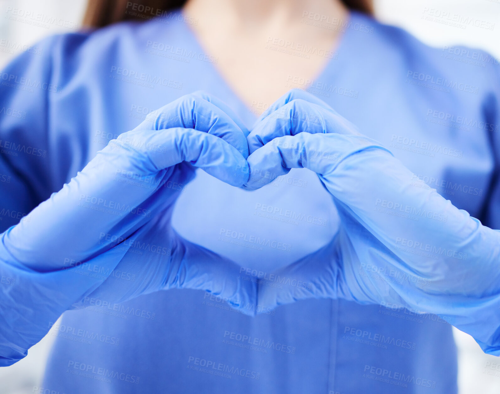 Buy stock photo Woman, doctor and hands in heart emoji for healthcare, life insurance or sign on mockup at hospital. Hand of medical female expert GP showing love, hearty symbol or gesture for medicare assurance
