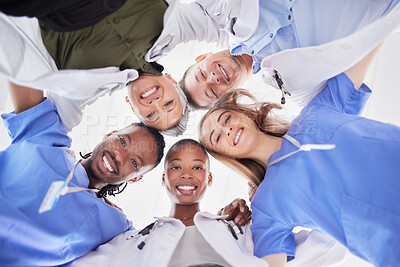 Buy stock photo Happy teamwork, diversity and doctors in huddle of support, help or medical collaboration. Portrait group of healthcare workers in circle with heads together, smile face and happy hospital management