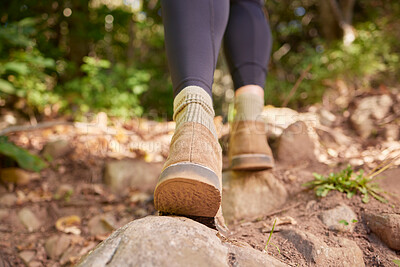 Buy stock photo Ground, woman shoes and hiking in forest, nature and rock path for wellness, exercise and outdoor adventure. Hiker girl, boots and freedom in woods, forrest and walk to explore landscape on holiday