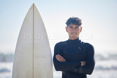 Buy stock photo Surfing, portrait and surfer man with blue sky outdoor for water sports, training and exercise. Surfboard, morning workout and sea with summer sun and young person ready for waves sport at the ocean