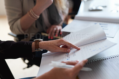 Buy stock photo Finance, stats and hands of a business person with a report in a meeting for investment and growth. Teamwork, data and employees reading a financial document with data, graph and economy analysis