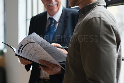 Buy stock photo Closeup, senior man and employee with documents, discussion and sign contract for new job, project and schedule. Zoom, male employee and manager with paperwork, management and planning in workplace