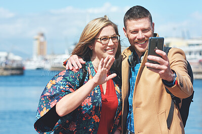 Buy stock photo Video call, travel and couple with phone by harbor enjoy vacation, holiday and journey in Amsterdam. Dating, communication and happy man and woman on smartphone for social media, vlog and influencer