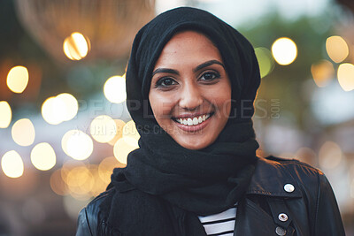 Buy stock photo Mockup, night and portrait of muslim woman in city with bokeh, lights and blurred background. Face, islamic and female relax in Dubai town for fun or explore, happy and smile outside with hijab