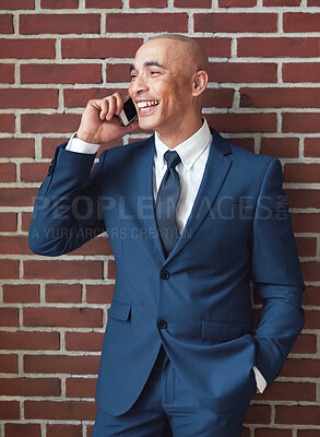 Buy stock photo Businessman, brick wall and phone call in suit with smile for networking, contact and corporate connection. Happy worker, leader and talking on mobile for trading deal, stock sales or client feedback