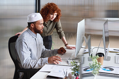 Buy stock photo Muslim, islamic and diverse colleagues working together on a computer planning a web design at a startup company. Office, diversity and business man with woman doing job online, website and internet