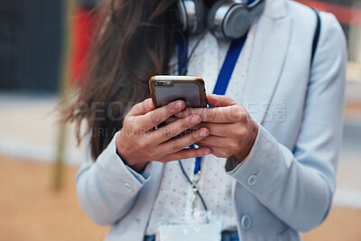 Buy stock photo Woman, hands and phone in communication, social media or texting and chatting in the city. Hand of female typing on smartphone with 5G connection, mobile app or browsing in networking outdoors
