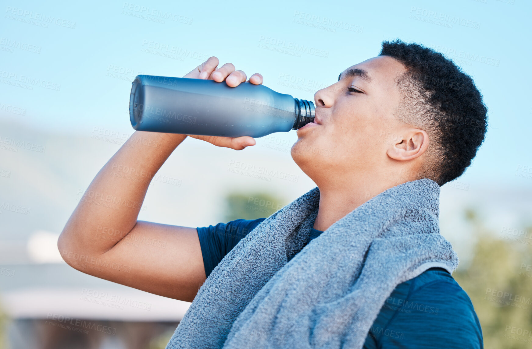 Buy stock photo Drinking water, fitness and tired man training, exercise or outdoor workout nutrition, health and wellness. Liquid bottle for diet, sports goals and cardio of runner, athlete or person on blue sky