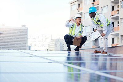 Buy stock photo Solar energy, sustainability and engineer team on a rooftop to repair, program or install renewable power in a city. Sustainable, man and teamwork by technician for eco friendly electricity 