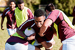 Team, tackle or rugby men in training, exercise or workout match on sports field running with a ball. Challenge, strong man or powerful group in tough competitive game with physical fitness or effort