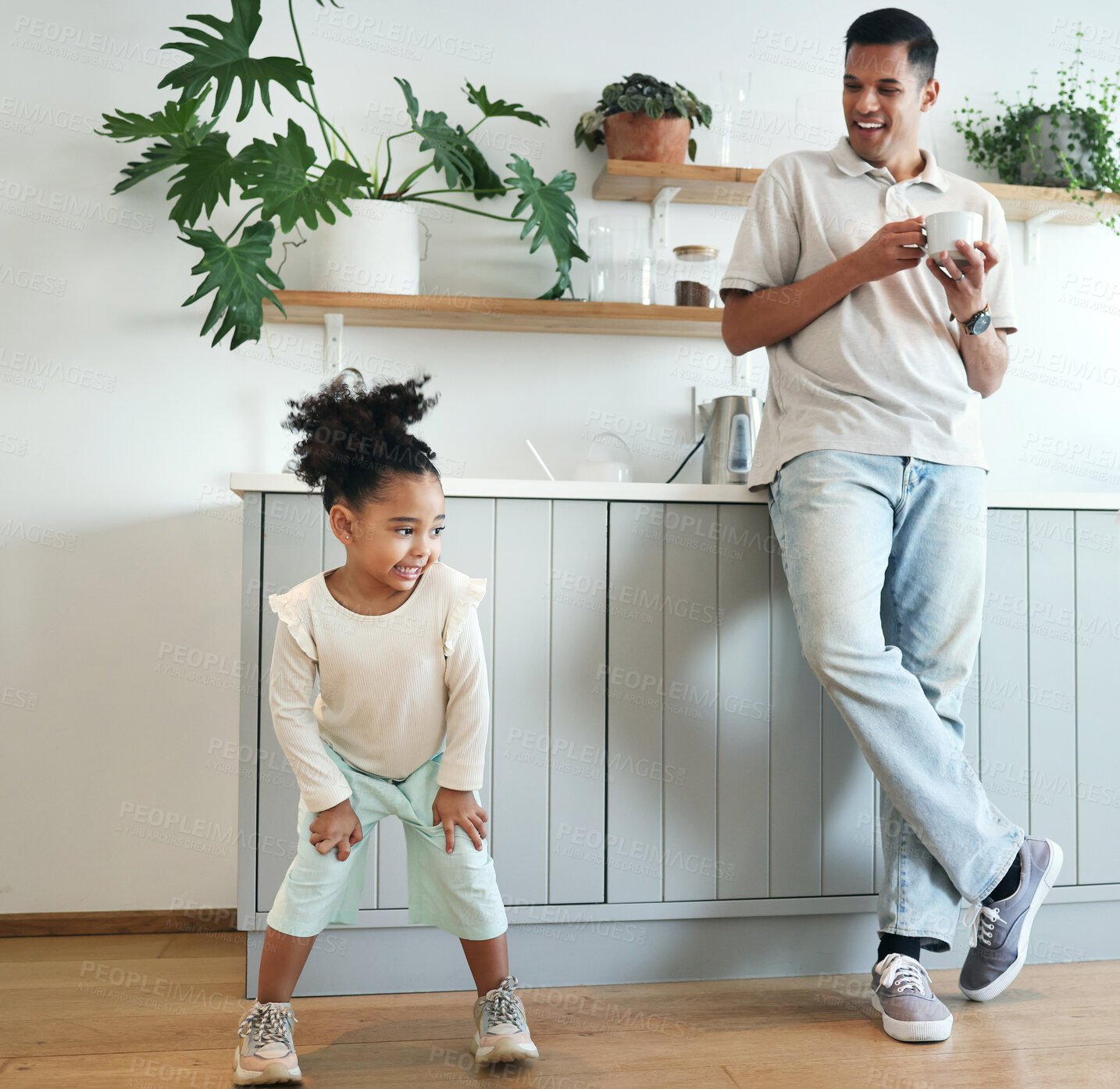 Buy stock photo Dance, happy and father with child bonding, playing and laughing together in the morning. Comic, funny and carefree girl dancing with her dad for happiness, comedy and freedom in a home kitchen