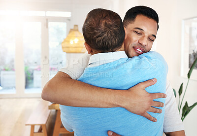 Buy stock photo Love, care and father and son with a hug for a visit, bonding and quality time. Happy, affection and dad hugging a man with an embrace after reunited, missing or showing appreciation in a home