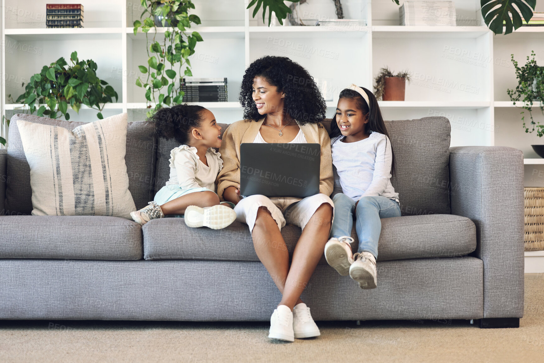 Buy stock photo Mother, children and laptop in family home living room for remote work, online education and wifi. Woman and girl kids together on couch with internet for learning, games and watch movies or relax
