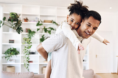 Buy stock photo Father, daughter and family home for a piggyback, love and care in the living room while happy. Man and a happy girl child together for bonding, trust and security or quality time and support