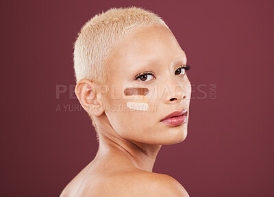 Buy stock photo Beauty, foundation and portrait of woman with makeup products, cosmetics and contour on studio background. Skincare, cosmetology and face of girl apply lines of skin tone, toner or facial treatment