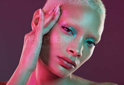 Buy stock photo Skincare, beauty and cyberpunk, portrait of woman with neon makeup and lights for creative advertising on studio background. Art girl, cosmetics and model isolated for futuristic face mockup