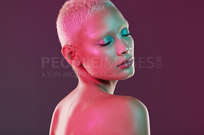 Buy stock photo Skincare, cosmetics and woman with neon makeup and lights for creative advertising on studio background. Cyberpunk, product placement and model isolated for and futuristic beauty and art mockup space
