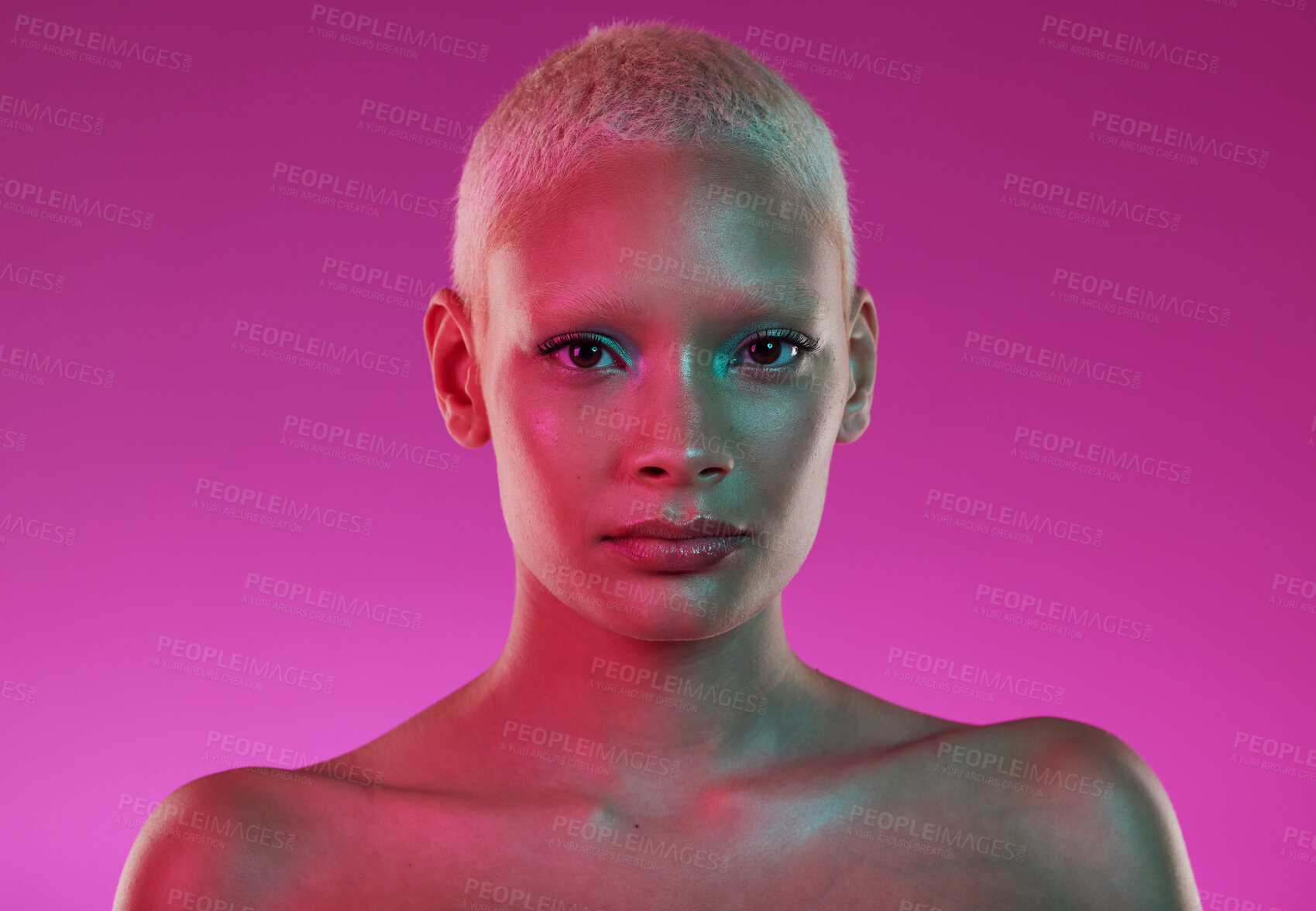 Buy stock photo Skincare, beauty and woman with neon face makeup and lights for creative advertising on pink background. Cyberpunk, product placement and model isolated for skin care and futuristic mock up in studio