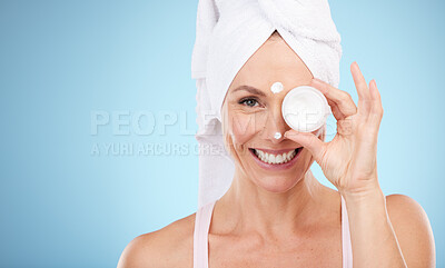 Buy stock photo Cream, jar and portrait of woman skincare for face, smile or cosmetics on mockup blue background. Facial lotion, beauty and model with container of healthy glow, shine or advertising aesthetic makeup