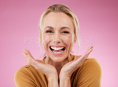 Buy stock photo Excited portrait, woman and smile on pink background, studio and backdrop for celebration of happiness. Happy mature model, face and confidence to celebrate with motivation, success or surprise hands