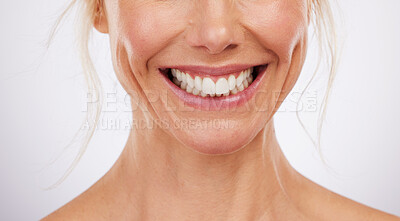 Buy stock photo Teeth whitening, mouth and smile of woman in studio, beauty background and fresh mint breath. Closeup female model, clean dental and happy face of skincare wellness, tooth implant and aesthetic salon