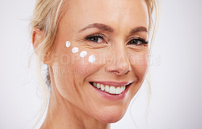 Buy stock photo Skincare, face cream and portrait of mature woman in studio for wellness, beauty and care on grey background. Facial, product or sunscreen by lady relax in luxury, cosmetic and lotion while isolated