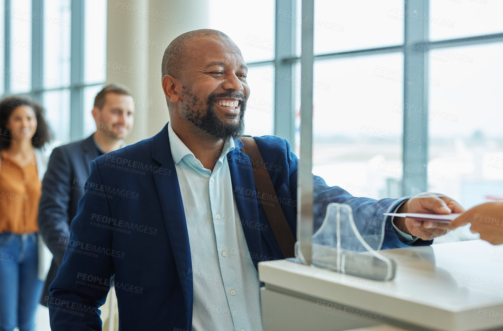 Buy stock photo Counter, ticket and black man in airport for passport check or in hotel line for travel service. Happy customer person at security booth or glass window for business booking and buying pass at seller
