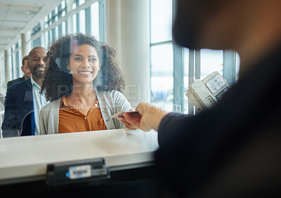 Buy stock photo Black woman, ticket check and airport counter with a paper for travel or box office service. Happy customer person at consultant booth window for passport, work booking and buying pass at seller