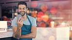 Small business, coffee shop and portrait of man with phone, mockup and confident smile in restaurant startup pub app. Success, happy manager or cafe barista with smartphone, apron and service mindset