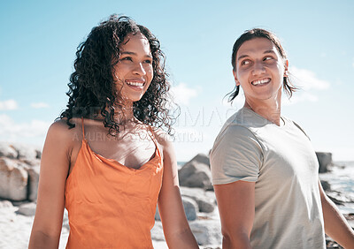 Buy stock photo Love, happy and couple at the beach for travel, fun and walking against blue sky background. Smile, affection and cheerful woman with man on vacation, relax and bond on summer trip together in Miami