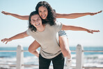 Freedom, travel and portrait of piggyback couple at beach, happy and playful against blue sky background. Face, airplane and fun woman with man on vacation, holiday or summer trip in Mexico together 