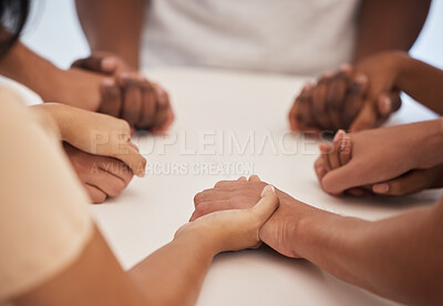 Buy stock photo Holding hands, praying and people worship for peace, trust or faith in God at a table together. Pray, Christian and community by group hand in prayer, praise or blessing while united in Jesus Christ