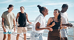 Friends, laughing and walking by beach, ocean or sea in social gathering joke, group vacation comedy or summer holiday. Smile, happy men and diversity women in travel, bonding or sharing funny story