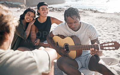 Buy stock photo Bonding people, playing or guitar by beach, ocean or sea in holiday vacation, summer travel or social gathering. Smile, happy and couple of friends with musical instrument in relax diversity picnic