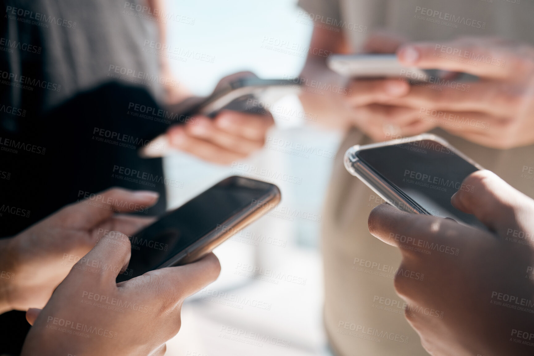 Buy stock photo Hands, phone and people networking on social media, mobile app or chatting on mockup screen. Hand of group holding smartphone in circle for online network share, data sync or communication on display