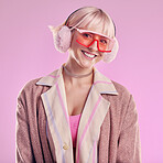 Fashion, portrait and a happy woman in studio with a smile, creativity and comic glasses on pink background. Face of an aesthetic model person with a smile for edgy vaporwave trend with color