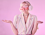 Confused, question and woman shrugging shoulders with fashion, why and isolated in a studio pink background. Cool, model and female stylist with doubt, dont know hopeless gesture with mockup