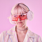 Woman, fashion and unique on a pink background in studio with funny glasses for cyberpunk style. Face of edgy, trendy or retro aesthetic person thinking vaporwave, creativity and art color clothes