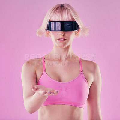 Buy stock photo Metaverse, VR glasses and a woman with hand mockup for future scifi 3d gaming technology. Cyberpunk person pink background for digital transformation for cyber world virtual reality product placement