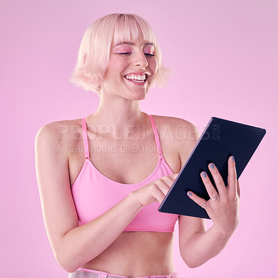 Buy stock photo Tablet, fashion and woman with smile on pink background for social media, online website and internet. Communication mockup, beauty and girl with makeup, cosmetics and digital tech for chatting