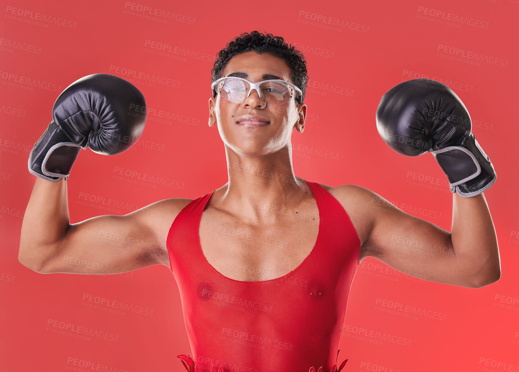 Buy stock photo Portrait, boxing and strong gay man with motivation isolated on a red background in a studio. Fight, fitness and lgbt person showing muscle from self defense exercise, training and challenge