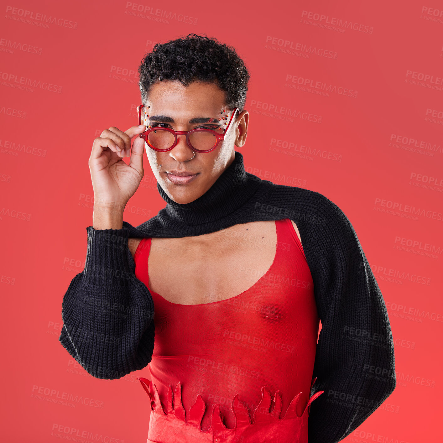 Buy stock photo Fashion, portrait and gay man with glasses isolated on a red background in a studio. Lgbt, vision and stylish model person with fashionable eyewear, edgy clothes and funky style on a backdrop